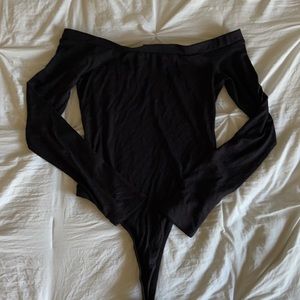 Off the shoulder black long sleeve one piece